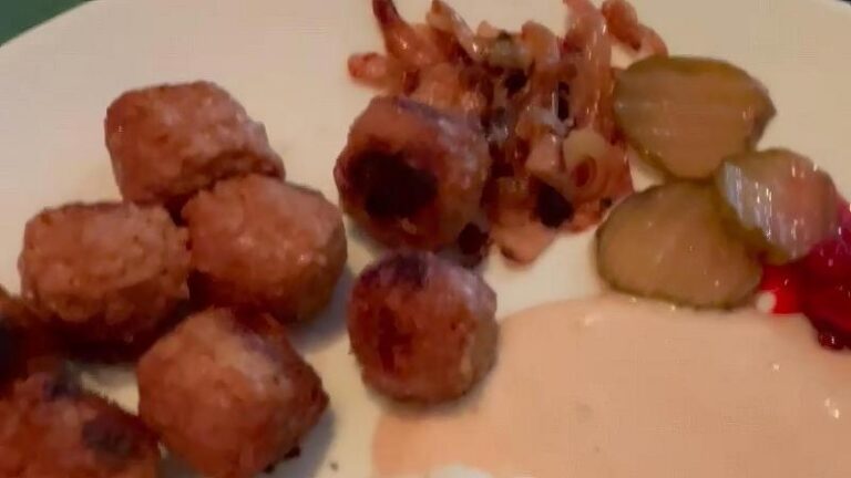 Close-up shot of vegan meatballs with creamy gravy at Dauns in London