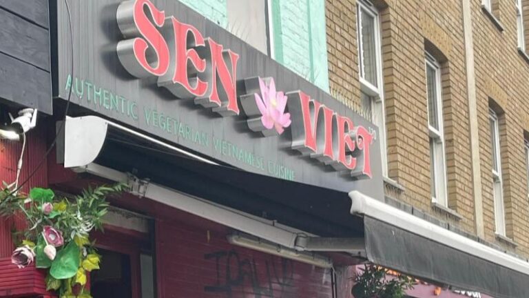 Sen Viet Vegan logo on the storefront sign