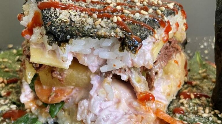 Very close-up shot of Sushi Tramezzino with yellow kimchi at Vegan Yes in London