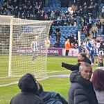 Colchester United fans celebrating during the second half against Barnet at the JobServe Community Stadium