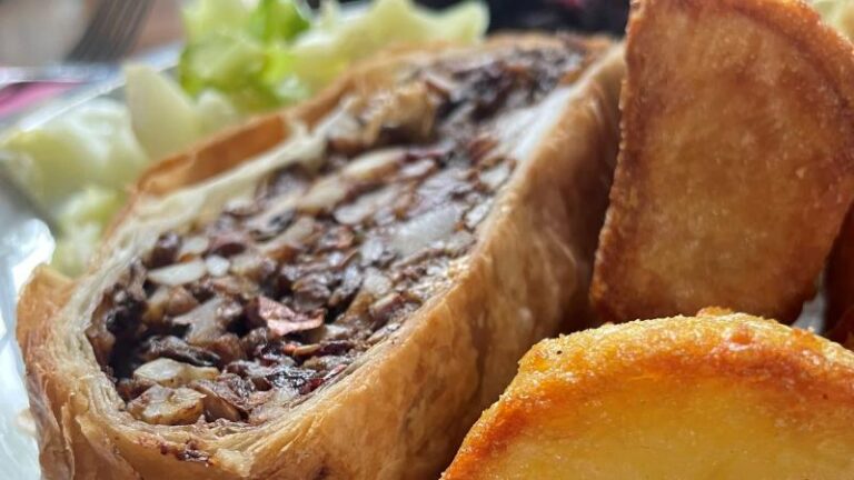Mushroom and chestnut Wellington with roast potatoes and vegetables at Donkey and Buskins