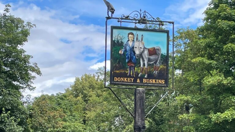 Outside pub sign for Donkey and Buskins near Colchester