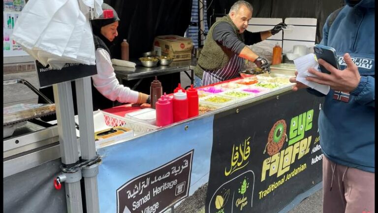 Workers preparing food at the busy Eye Falafel street food stall in London