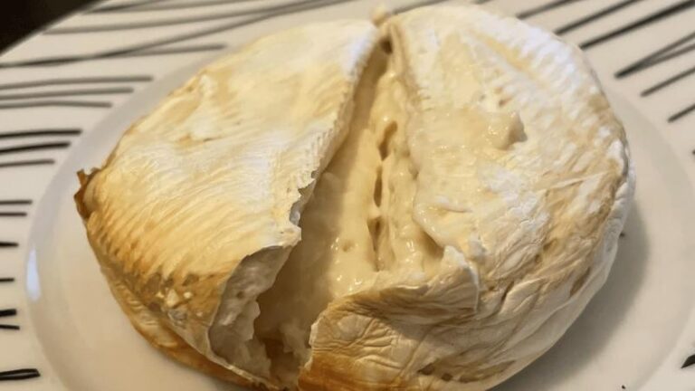 Close-up of baked Honestly Tasty Shamembert with the creamy middle showing