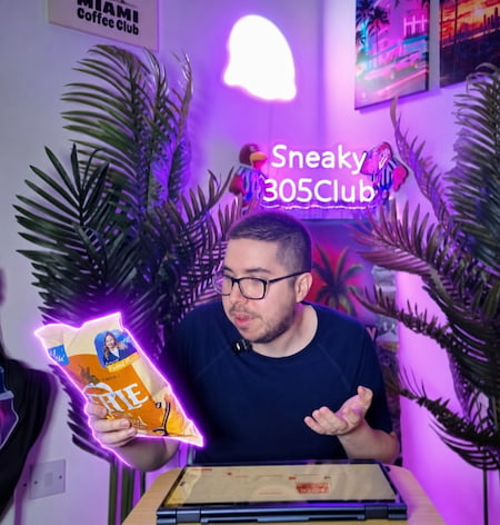 Ian looking at a bag of Kettle Honey Dijon Mustard crisps during his review