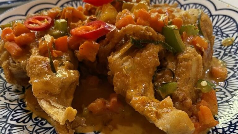Close-up of crispy tempura banana blossom in red coconut sauce from Lemongrass at The Moor Market in Sheffield