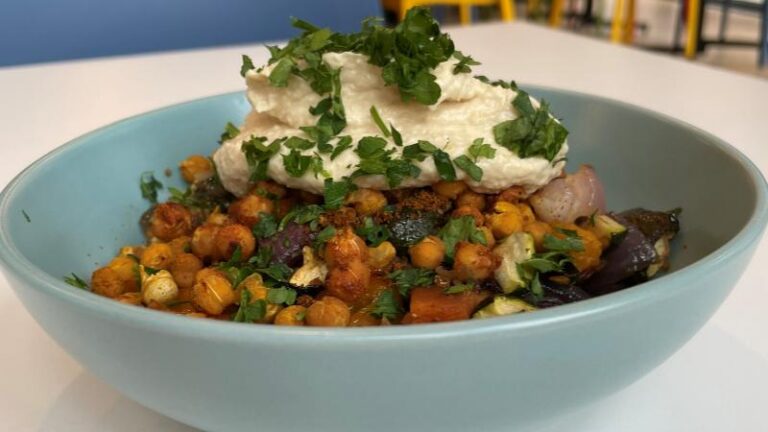Close-up of the vegan Tagine Bowl with chickpeas, hummus and vegetables at Level Best Café in Colchester