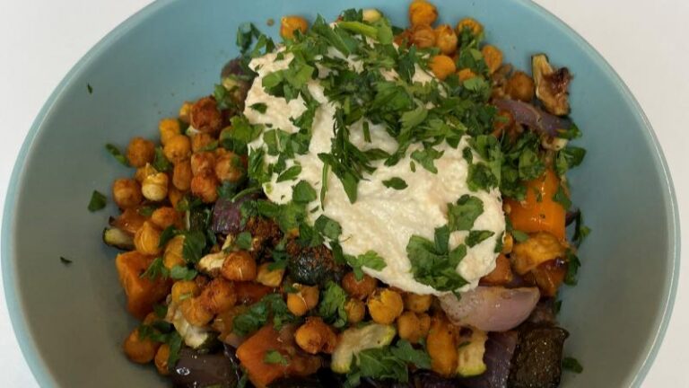Overhead shot of the vegan Tagine Bowl with chickpeas, vegetables, couscous and hummus at Level Best Café in Colchester