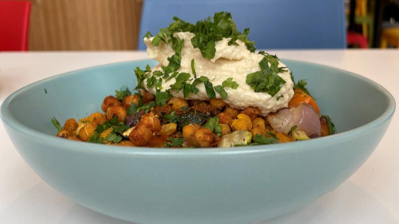 Vegan Tagine Bowl with vegetables, chickpeas, couscous and hummus at Level Best Café in Colchester
