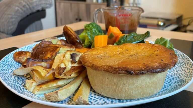 Magpye and Honestly Tasty Steak and Blue Cheese Pie served with chips, vegetables and gravy