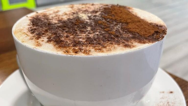 Oat milk cappuccino with chocolate sprinkles at Mill Races in Aldham near Colchester