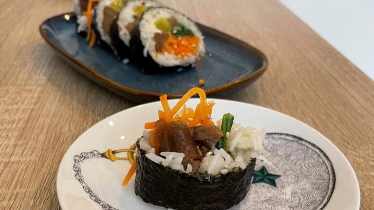 Vegan Fat Rolls (KimBap) on two plates at MukBap in London
