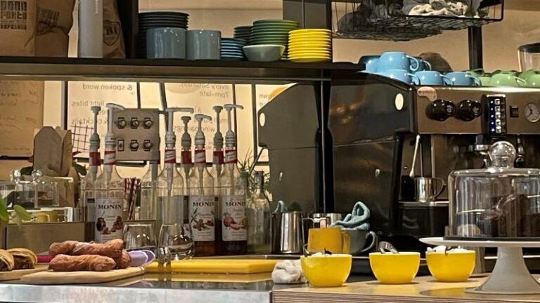 Photo of the coffee machine and coffee syrups at the serving counter inside Patch in Colchester