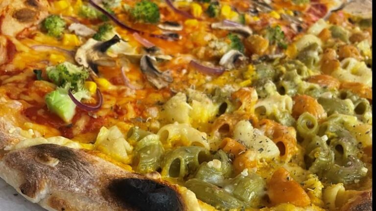 Another close-up shot of a half and half pizza from Piehole Pizzas in Southend, taken slightly further out