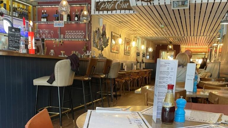 Inside Pier One restaurant in Frinton-on-Sea showing the bar and seating area