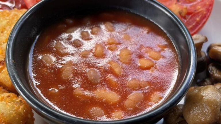 Close-up of baked beans from the vegan breakfast at Shoulder of Mutton near Colchester