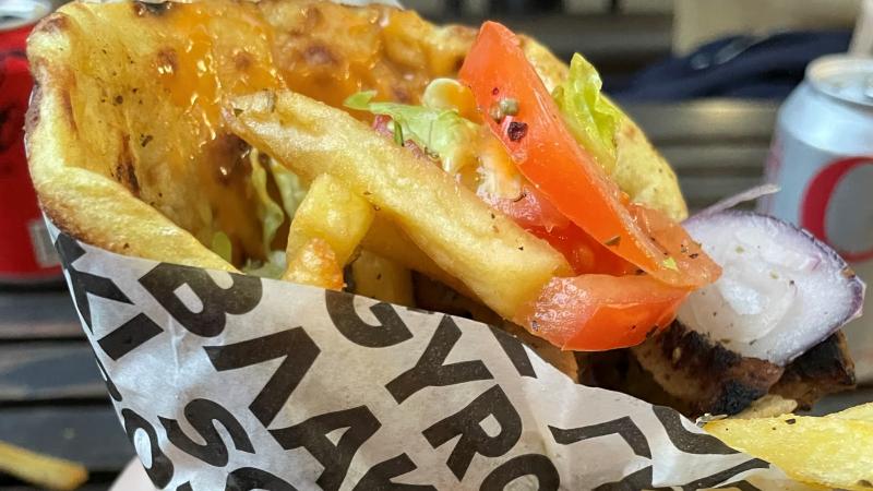 Close-up shot of a vegan gyros wrap from The Athenian