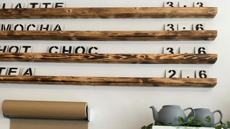 Drinks menu board inside The Hop Coffee plant-based cafe in Sheffield