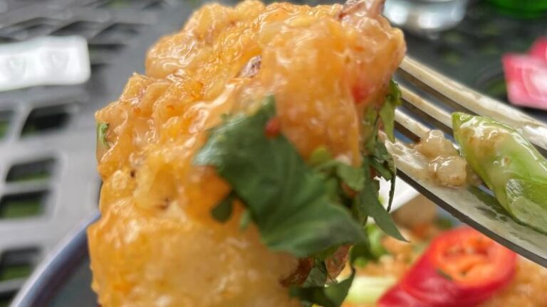 Close-up of Bang Bang Cauliflower Wings on a fork at The Swan in Chappel