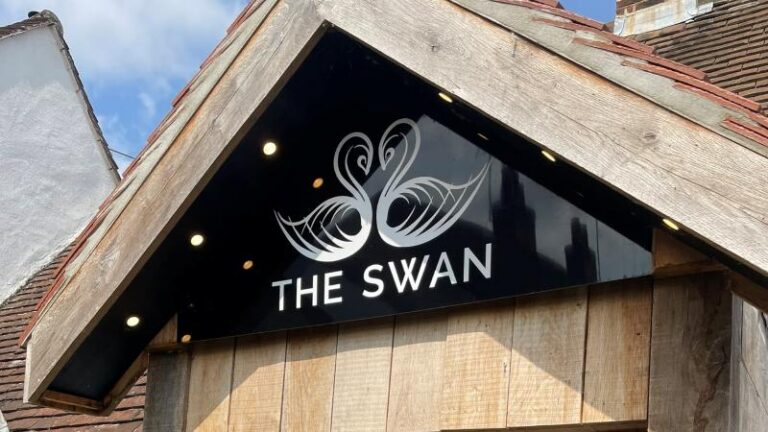 Outside sign for The Swan in Chappel, Essex