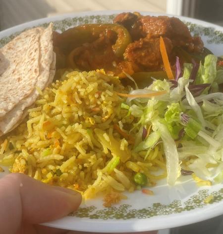 Plate of Jomidar Mahal Lahori lamb curry with special rice, chapati and salad