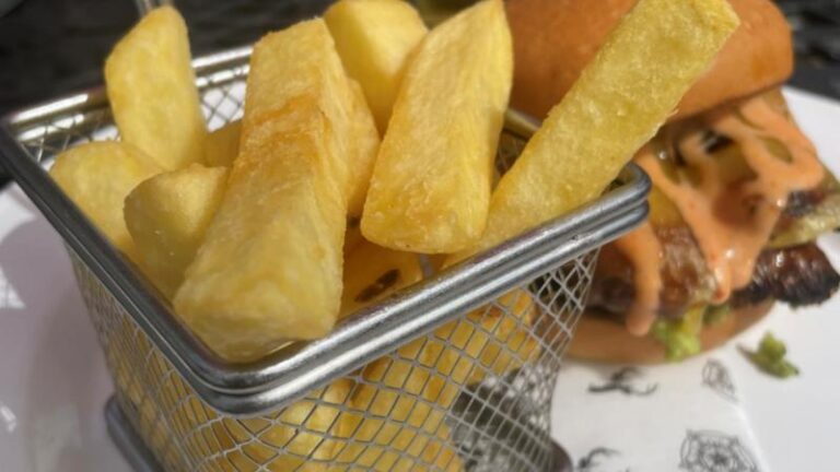 Chips served beside the Vegan Dirty Brunch Burger at The Swan in Chappel